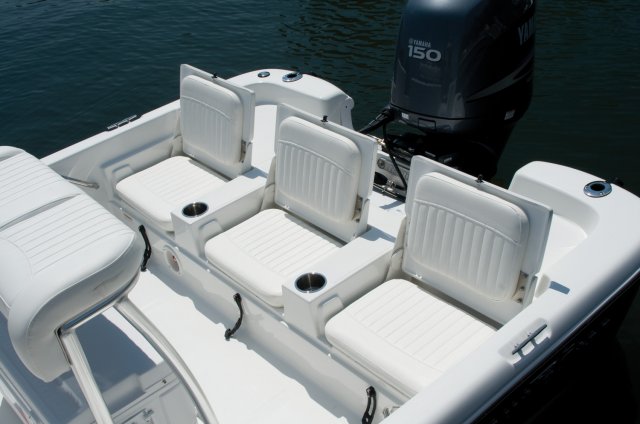 Aft Seating Glass fibers either loose or woven, reinforced with resin and used in the construction of many boats.