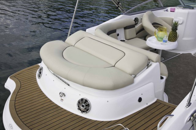 Aft Lounge Glass fibers either loose or woven, reinforced with resin and used in the construction of many boats.