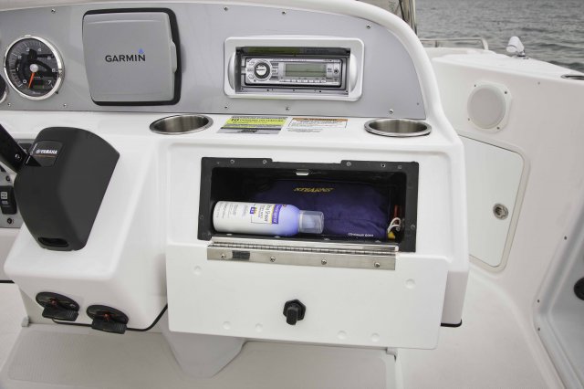 Glove Box Glass fibers either loose or woven, reinforced with resin and used in the construction of many boats.