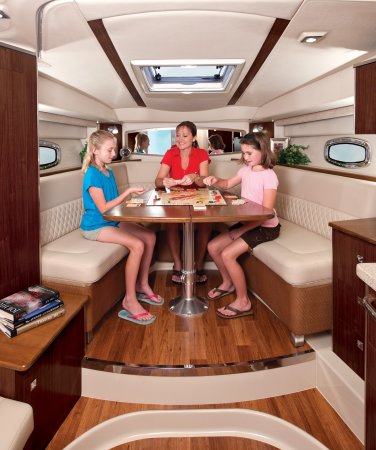 V Berth Table A stern drive is called an Inboard/Outboard, reflecting its design. It is designed so that its engine is inside and enclosed by the boat, while the propulsion system (out drive) is outside of the boat. The twin will have two engines and drives.